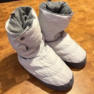 REI puffy down slippers…cheep your feet cozy.